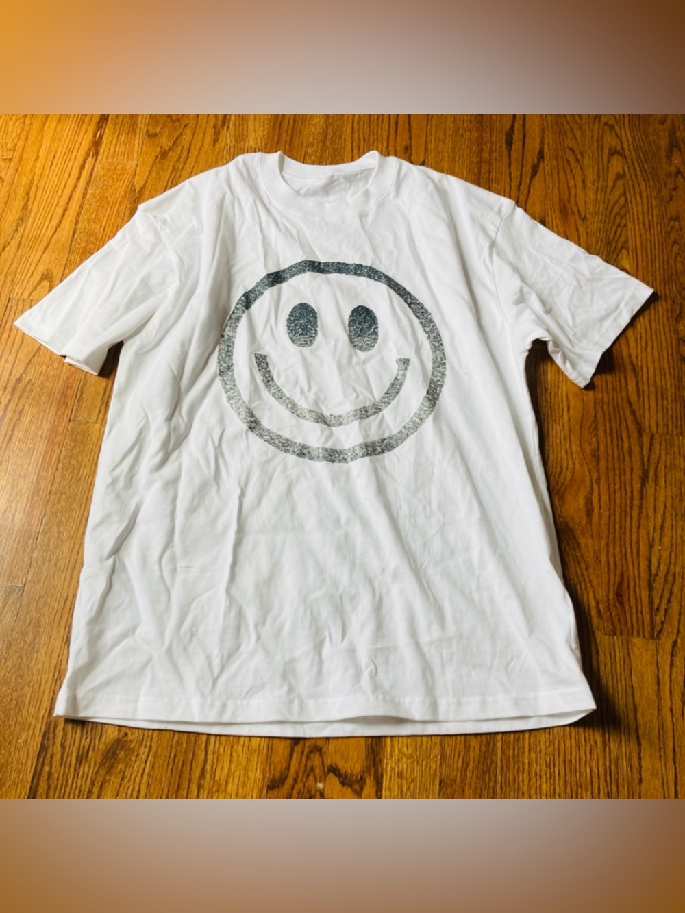 New smiley face tee